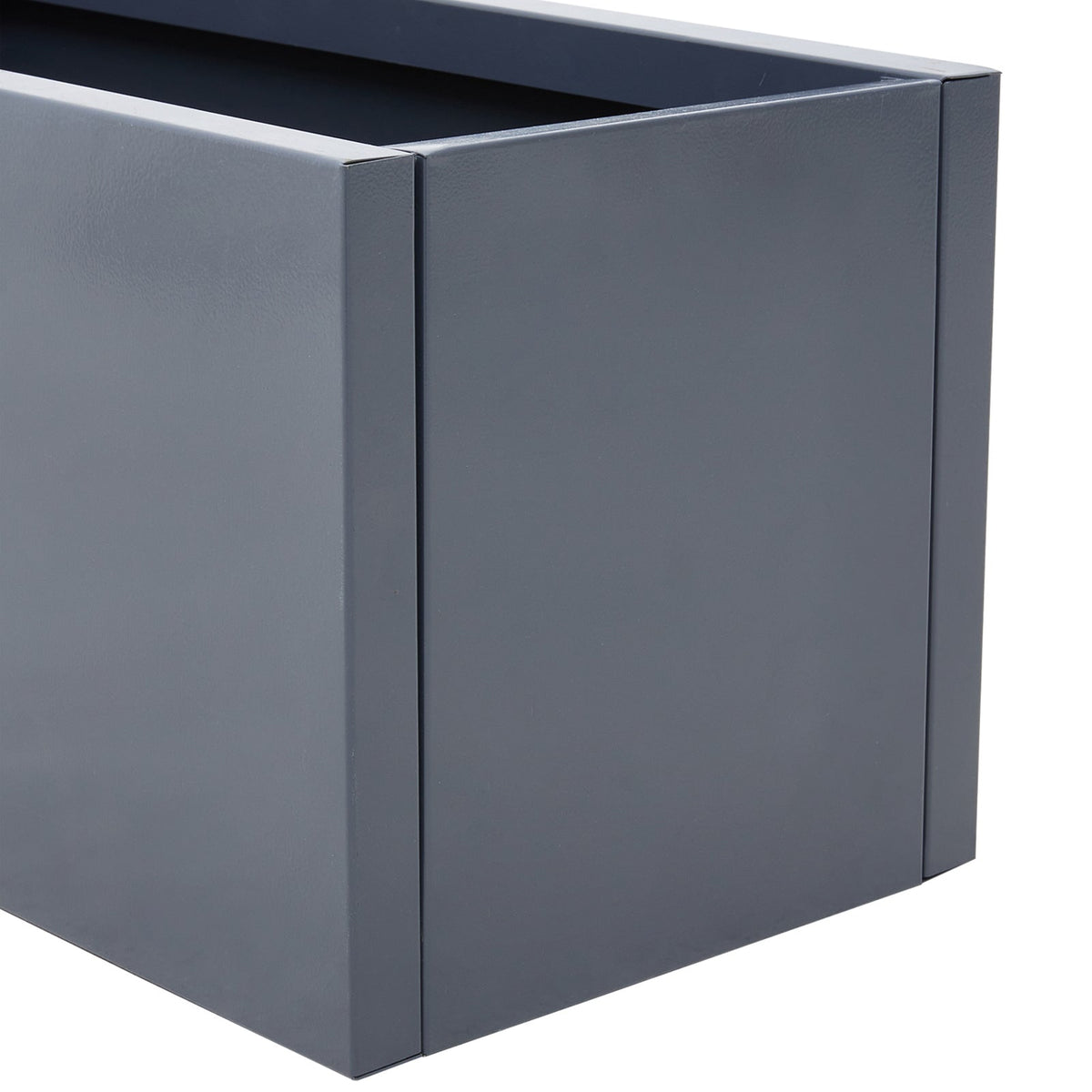 Close view of the grey steel planter's corner and rim on white