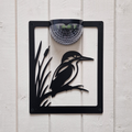 Open kingfisher and reeds cut-out solar plaque on white painted cladding