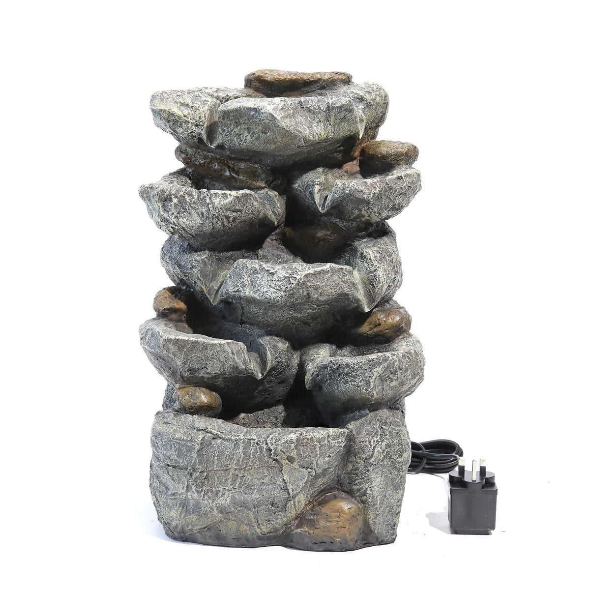 Grey stone-effect rock cascade fountain on white with its plug-in power adapter
