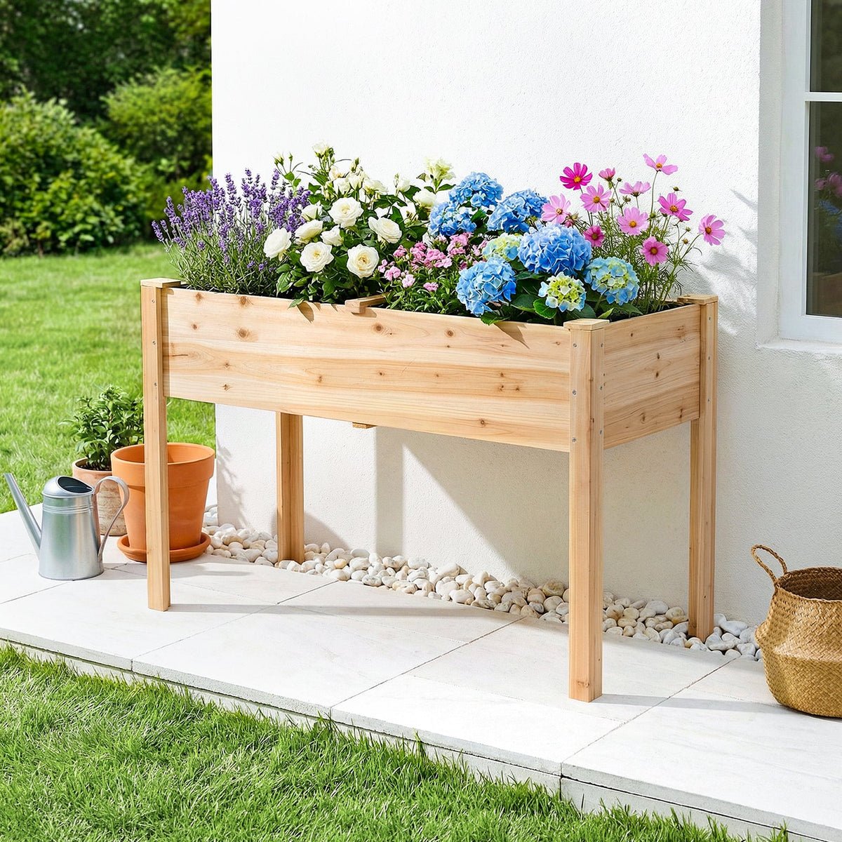 Natural wood elevated planter full of hydrangeas and lavender on a garden terrace