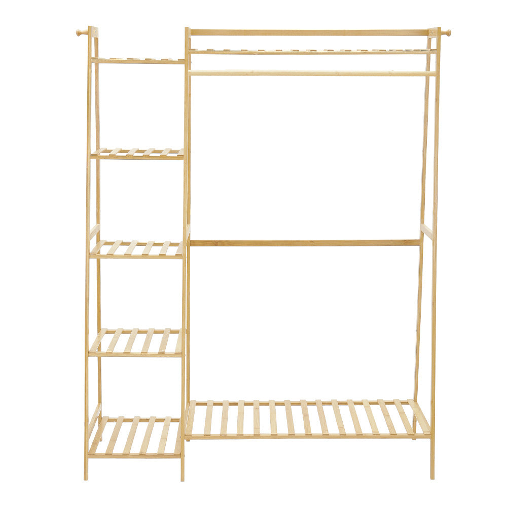 Natural bamboo clothes rack with a side shelf tower and hanging rail on white