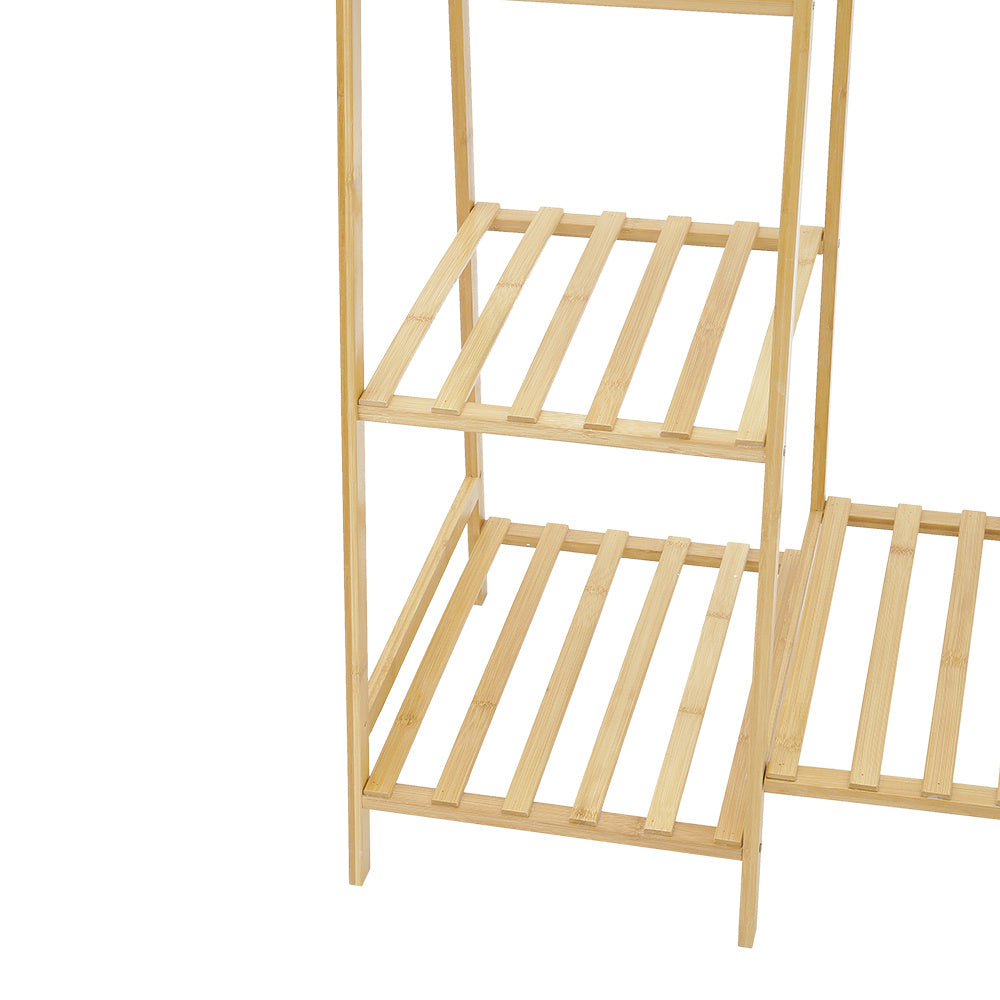 Close-up of the slatted side shelves of the bamboo clothes rack