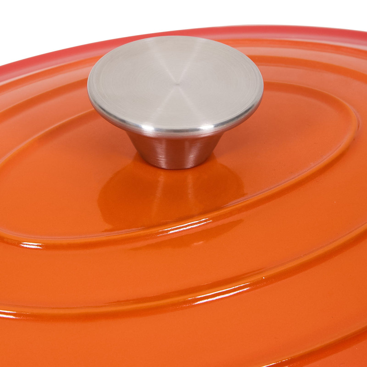 Close-up of the brushed steel knob on the orange ringed lid