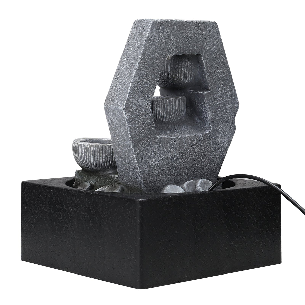 Back of the hexagonal fountain frame on its black basin with the cable