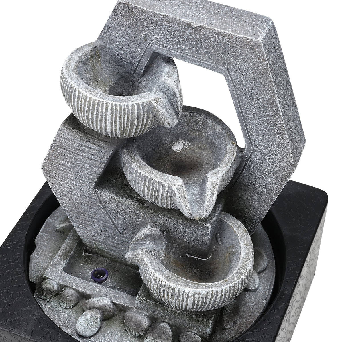 Top view of the three ribbed resin bowls inside the hexagonal frame