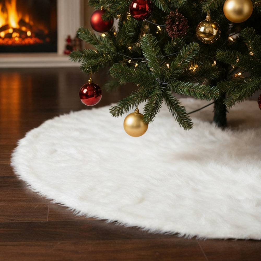 Close view of the soft white long pile of the tree skirt under a decorated tree