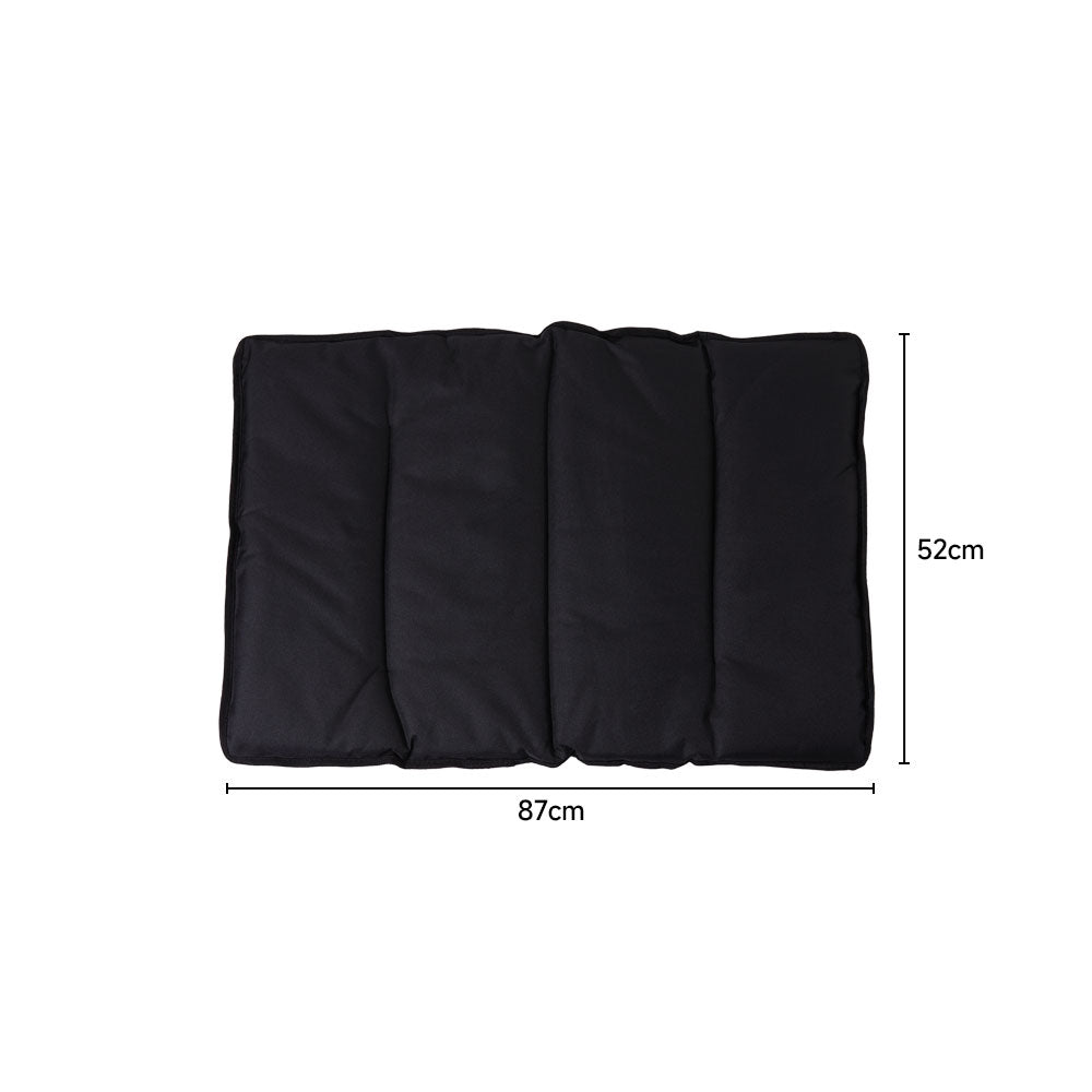 Black chair cushion laid flat with lines marking 87 cm long and 52 cm wide