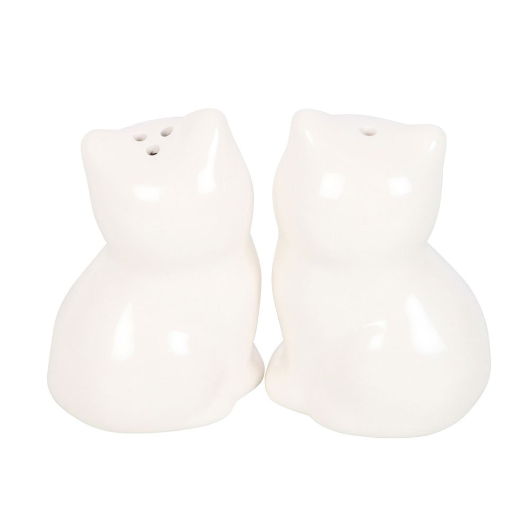 Back of the two cat shakers on white, showing the pour holes on top of their heads