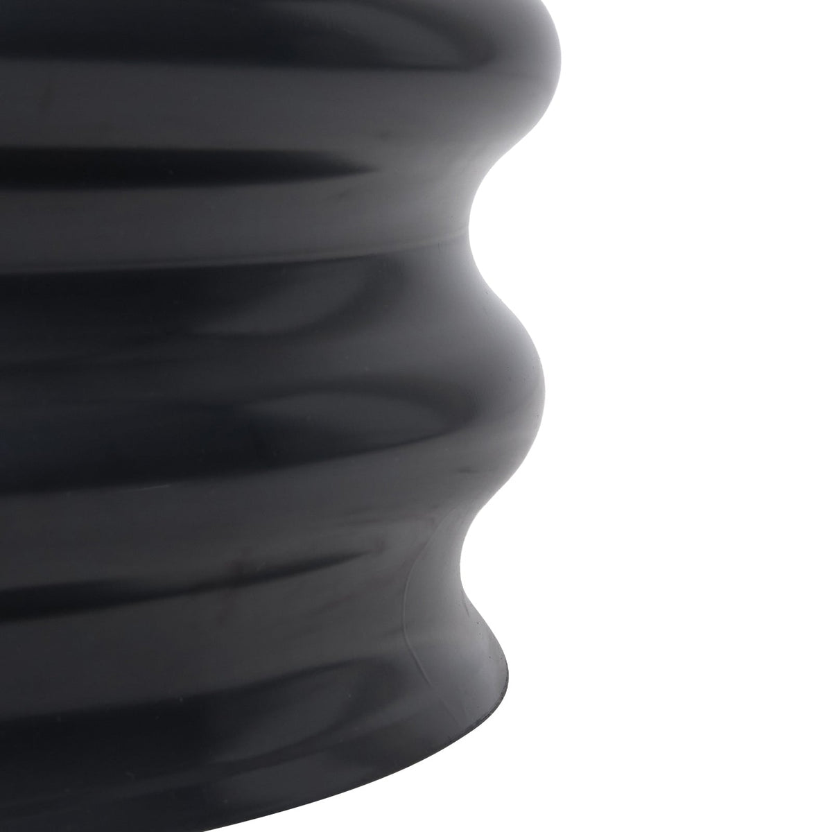 Close-up of the rounded ribs of the corrugated steel wall