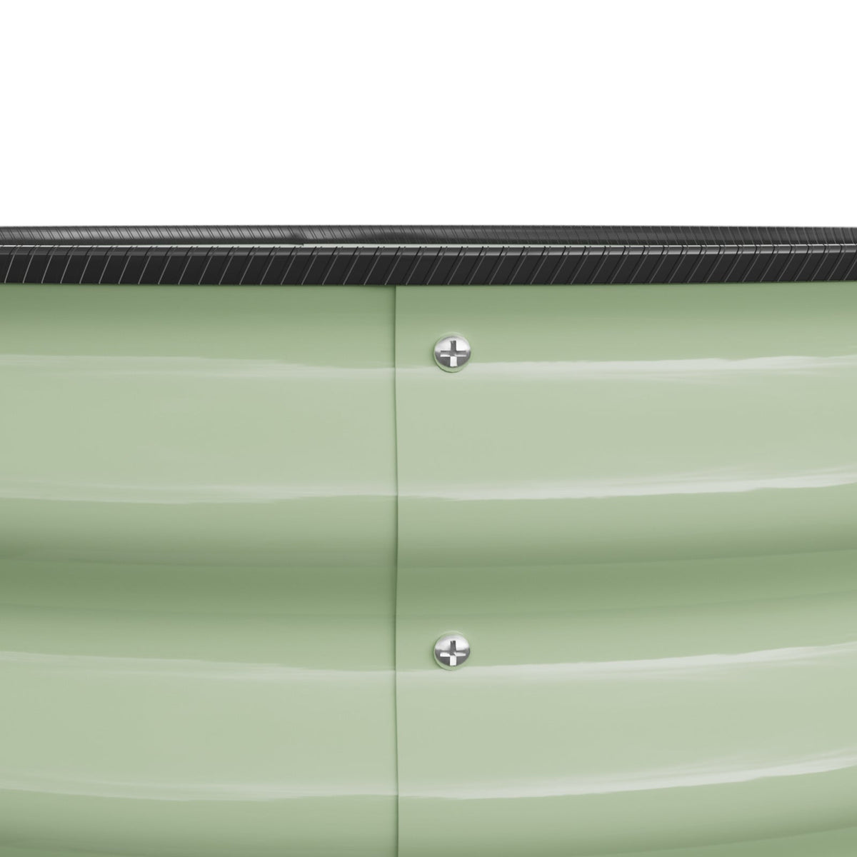 Close-up of a screwed seam on the sage green steel wall