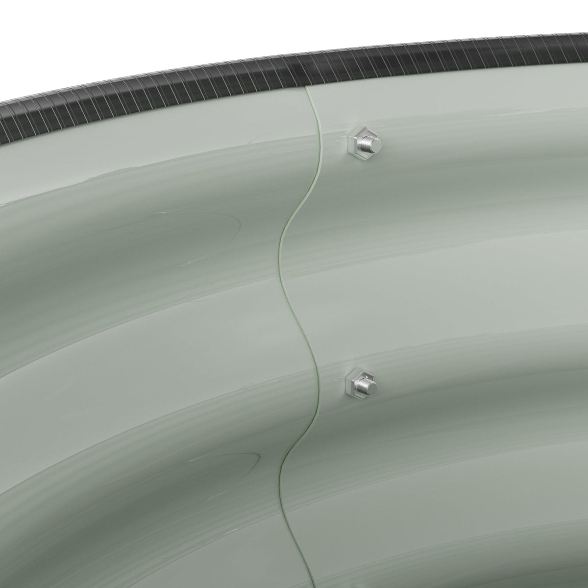 Close-up of a vertical seam with screws below the rubber rim