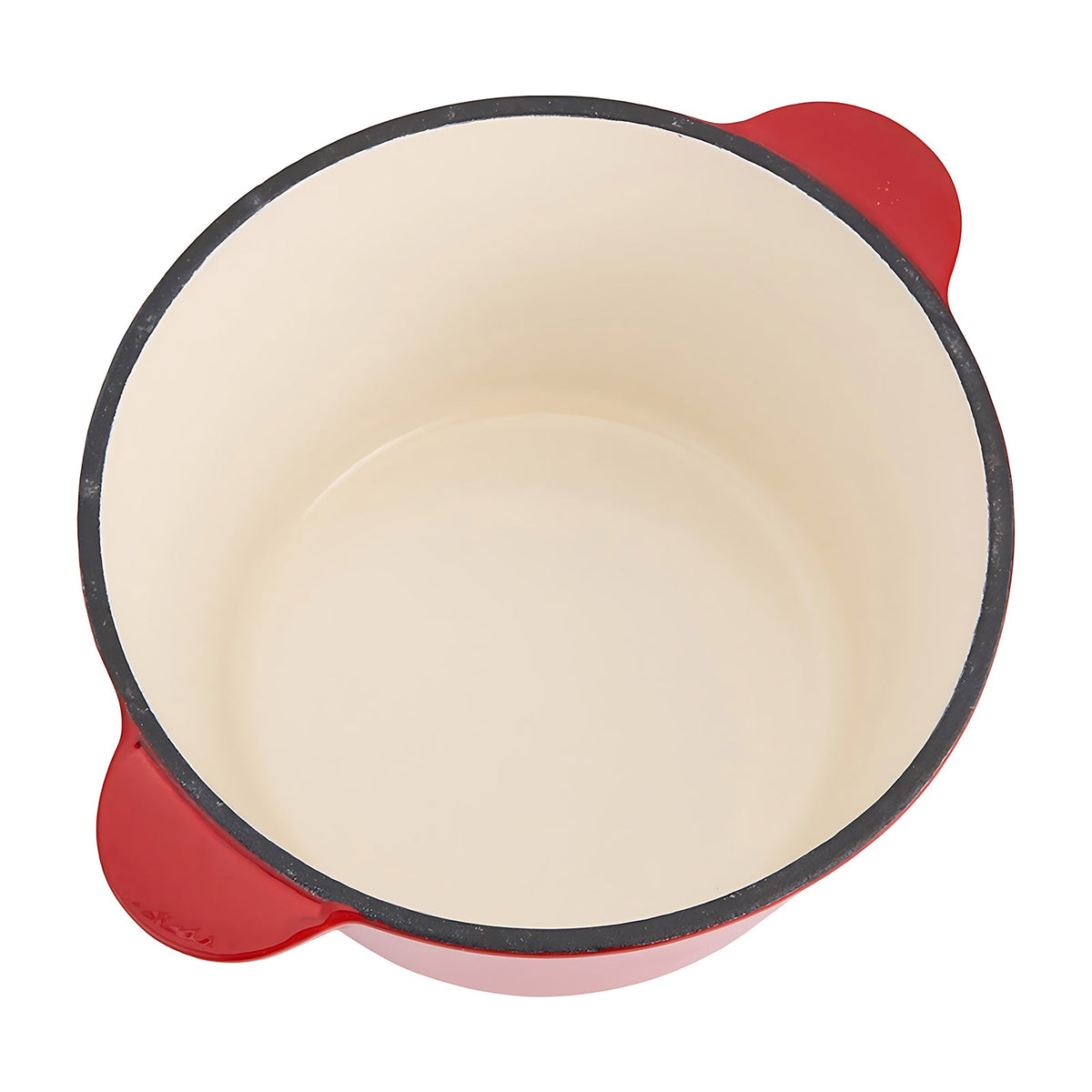 Top view into the empty fondue pot showing the cream enamel inside