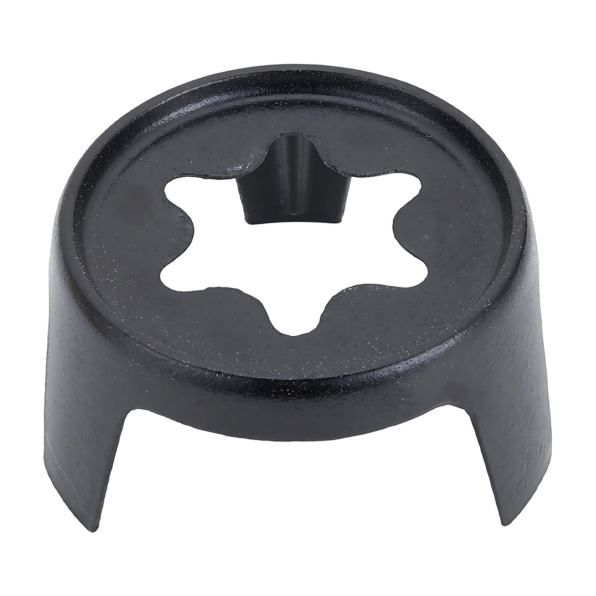 Black cast iron fondue stand with a star-shaped opening and three legs on white