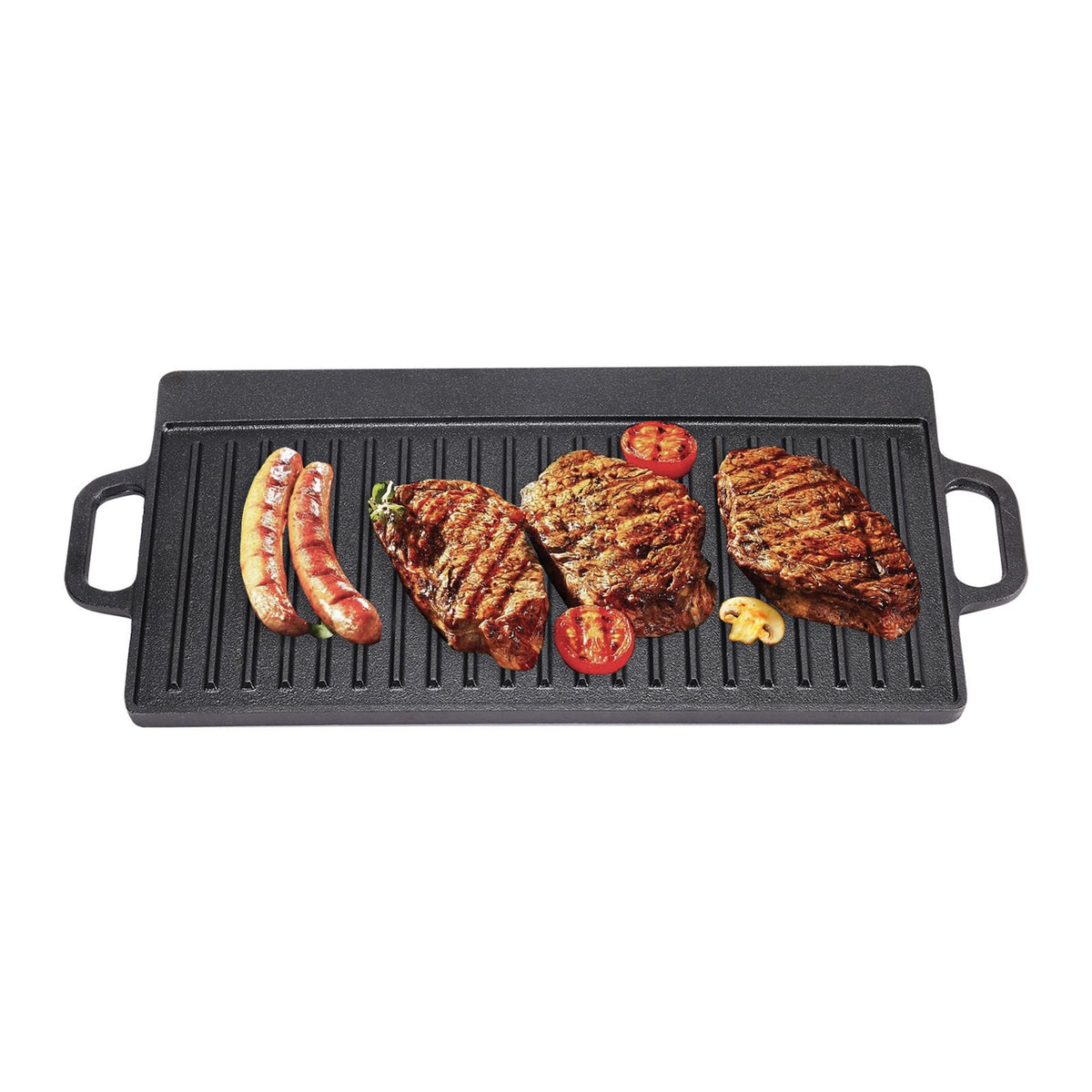 Ribbed cast iron griddle with sausages, steaks and tomatoes on white