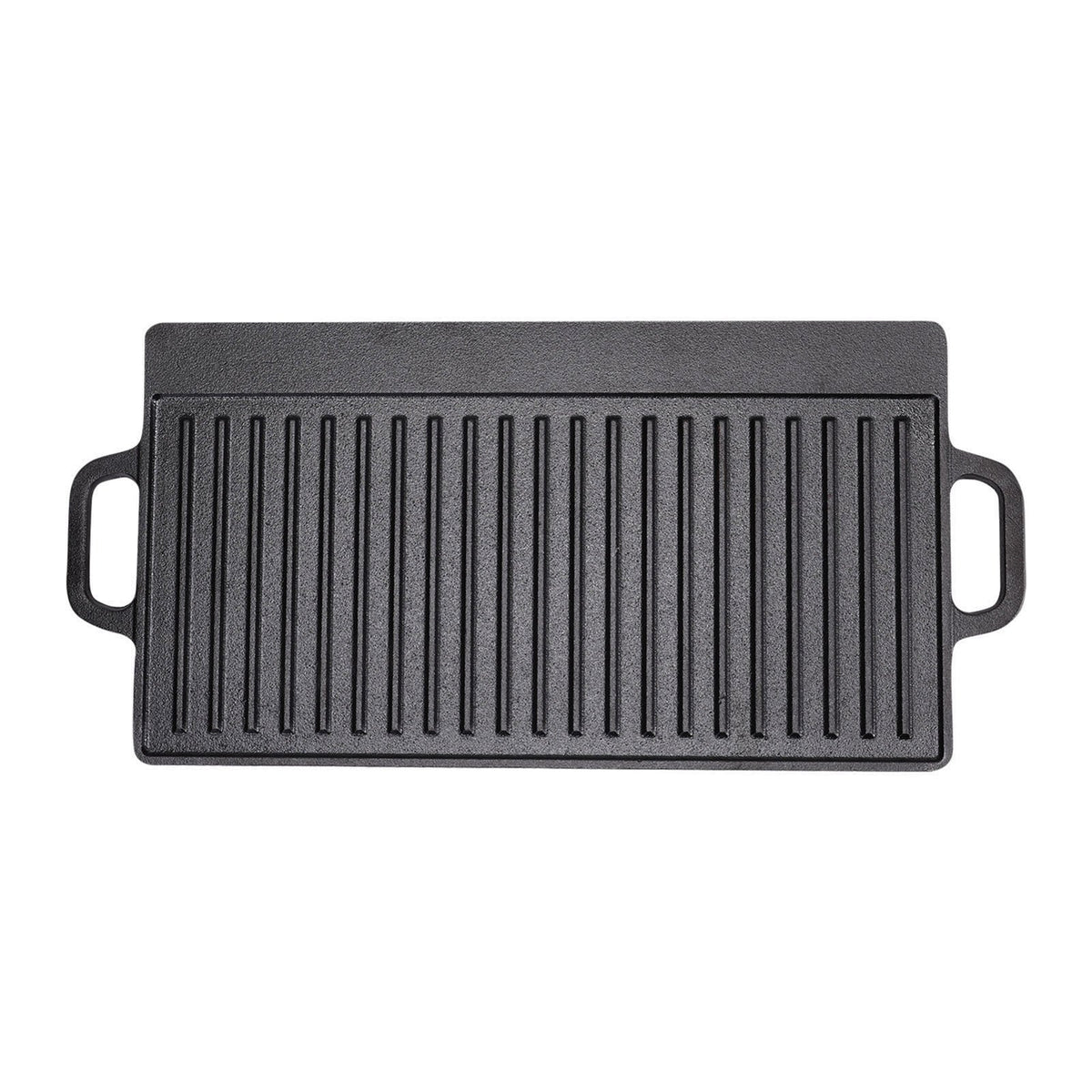 Ribbed side of the black cast iron griddle with its two loop handles on white