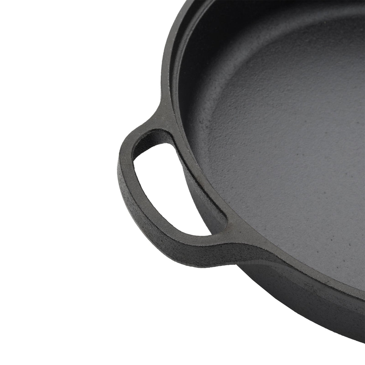 Close-up of a cast loop handle on the skillet rim