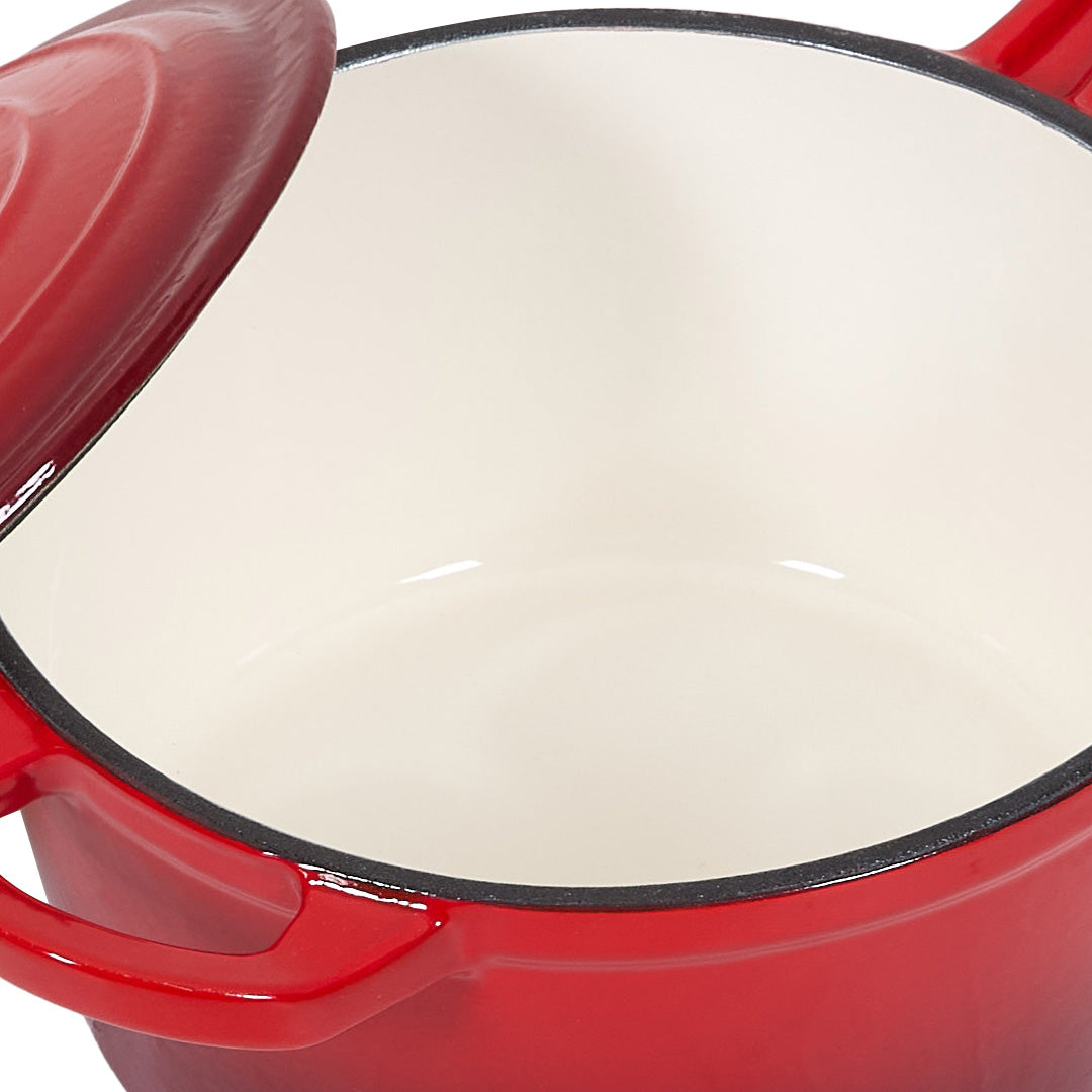 Close-up of the cream enamel interior and red rim of the saucepan