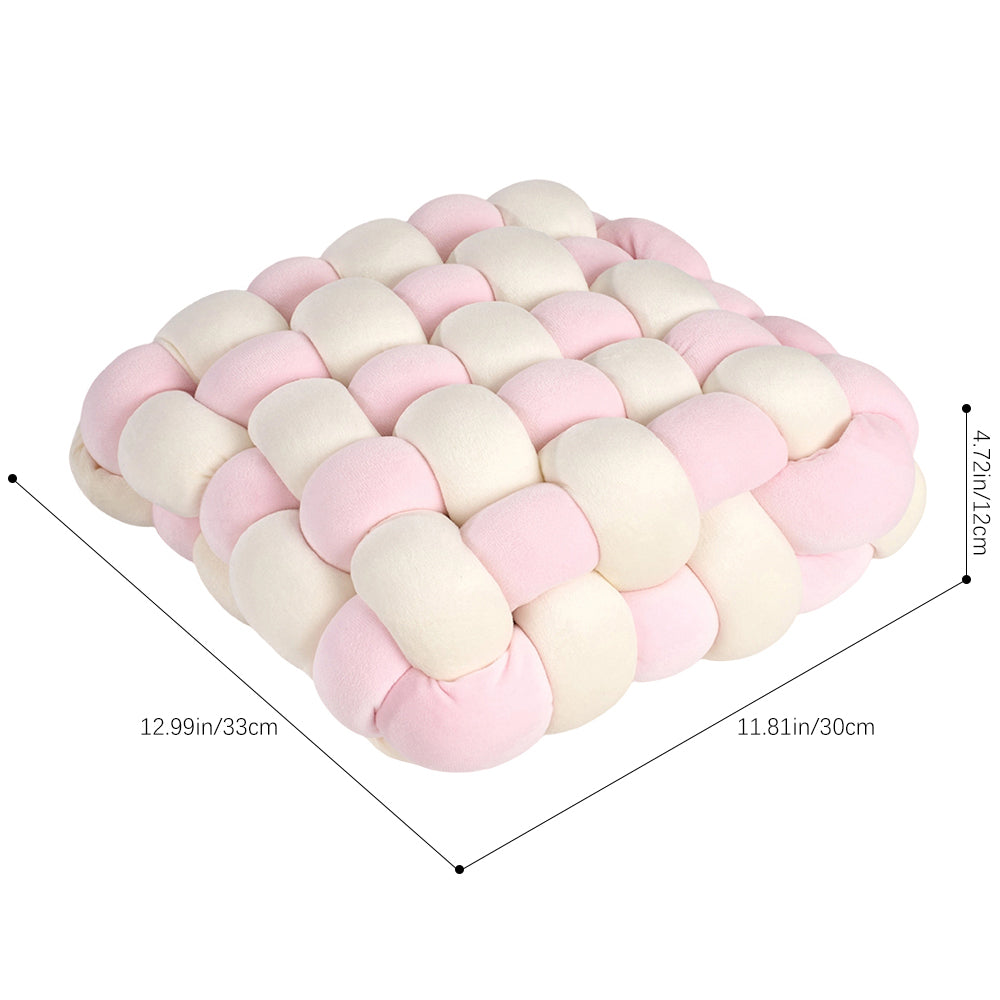 Cream and pink knotted cushion on white with lines marking 33 cm, 30 cm and 12 cm