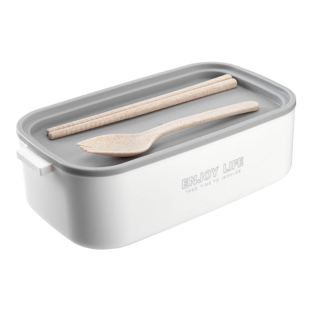 Open tier of the lunch box with a grey tray holding a spoon and a fork