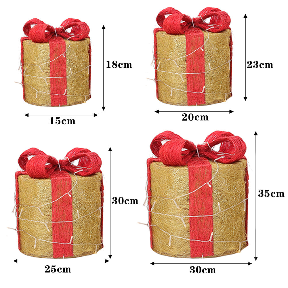 Four gold gift boxes with red bows on white, marked 15 × 18, 20 × 23, 25 × 30 and 30 × 35 cm
