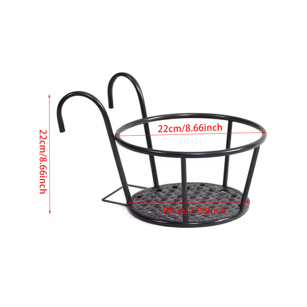 Empty iron pot holder on white marked 22 cm across the top and 22 cm tall