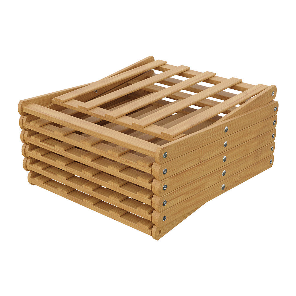 The light bamboo shoe rack folded flat into a compact stack