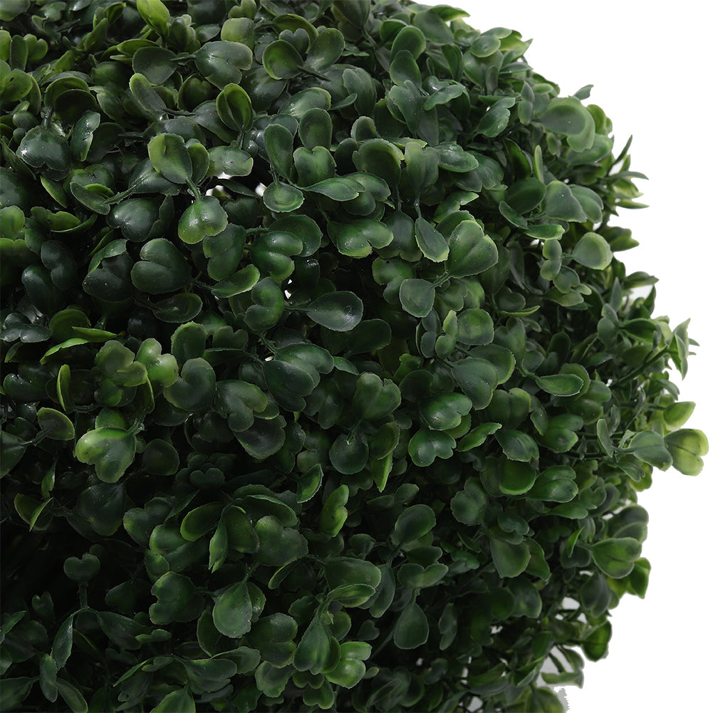 Close-up of the small green artificial boxwood leaves