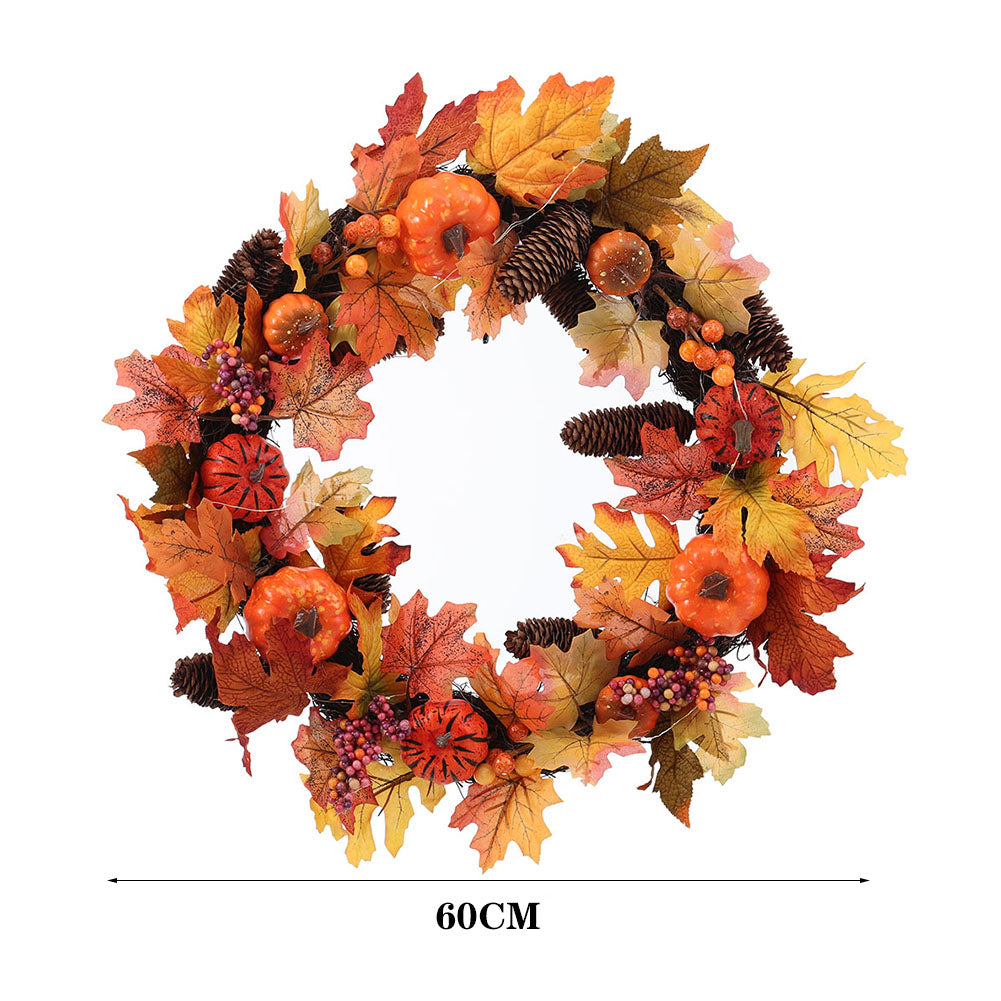The autumn wreath on white with a line marking its 60 cm width