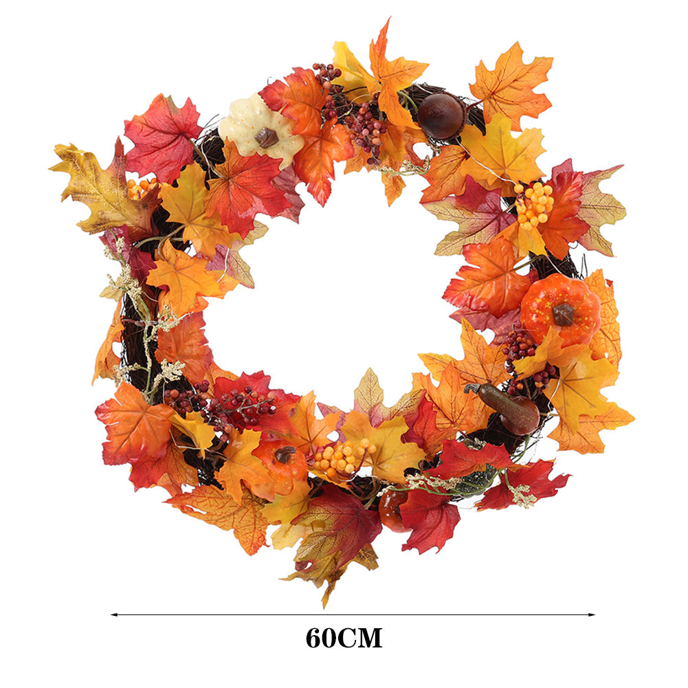 The autumn wreath on white with a line marking its 60 cm width