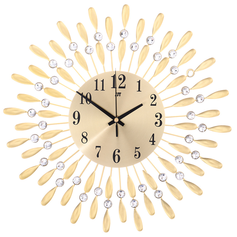 Front view of the round gold wall clock with crystal-set rays on white