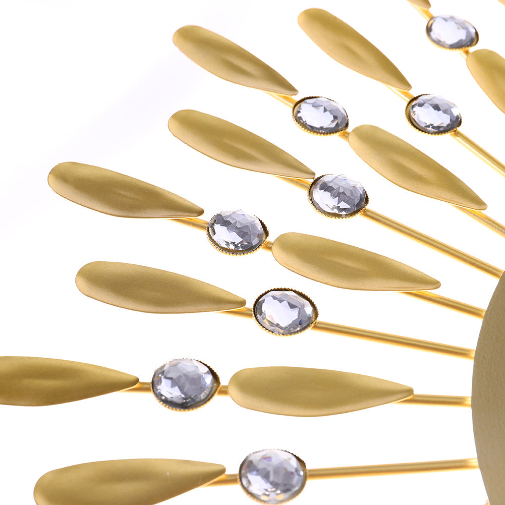 Close-up of the gold drop-shaped rays with clear crystal beads