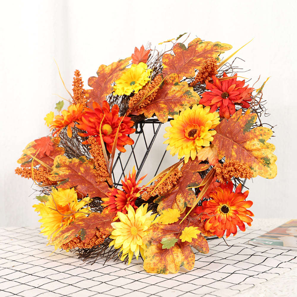 The daisy wreath resting on a white stool