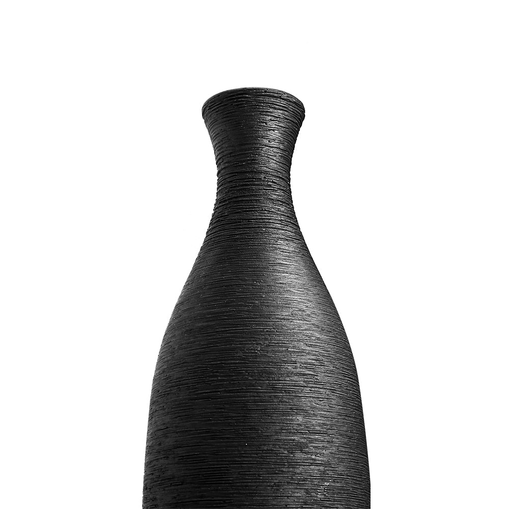 Close-up of the narrow neck and small mouth of the black vase