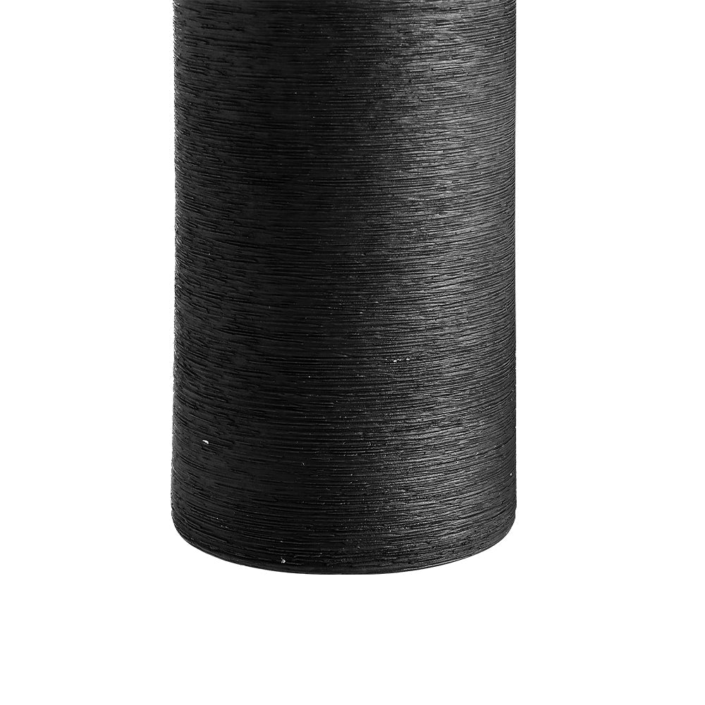 Close-up of the fine brushed texture on the black porcelain