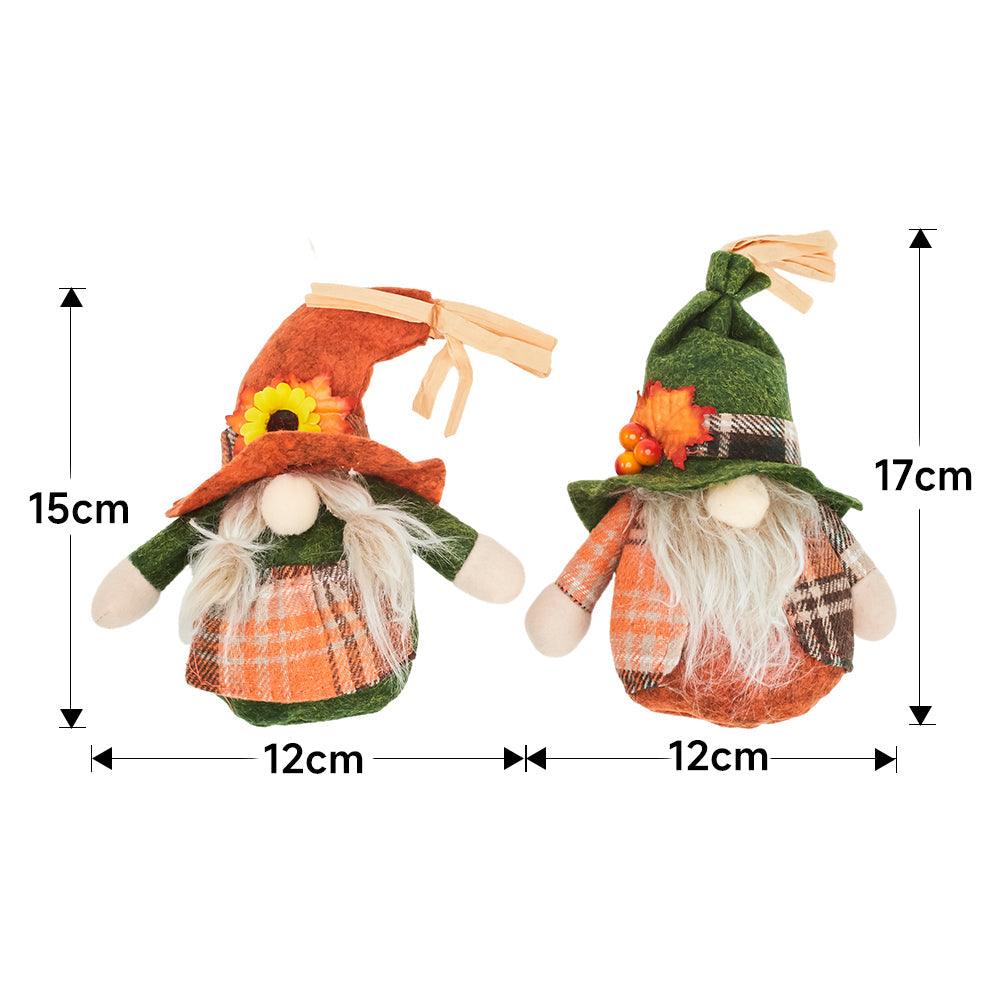 Both gnomes on white, the orange one marked 15 cm tall and the green one 17 cm, each 12 cm wide