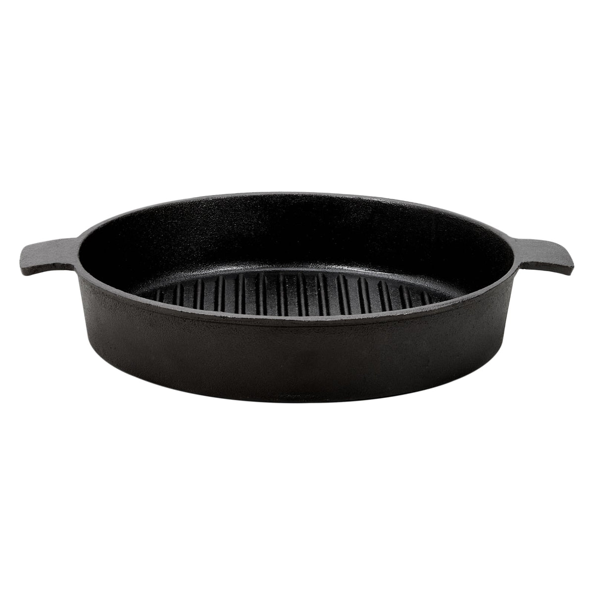 Side view of the empty round cast iron grill pan with two tab handles on white