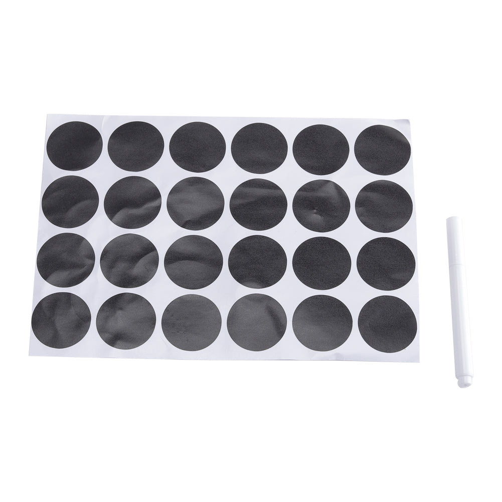 Sheet of 24 round black labels and a white marker pen, on white