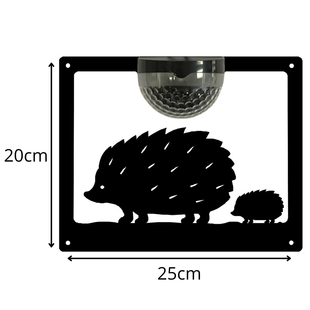 Hedgehog solar plaque on white, marked 25 cm wide and 20 cm high