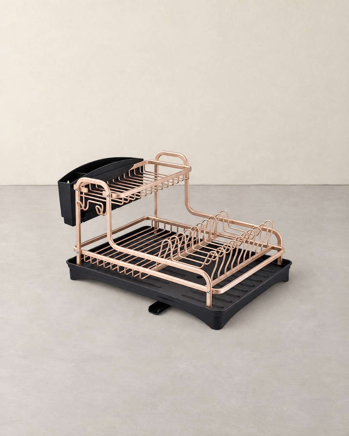 Two-tier rose gold dish drying rack with black drip tray and cutlery holder, empty