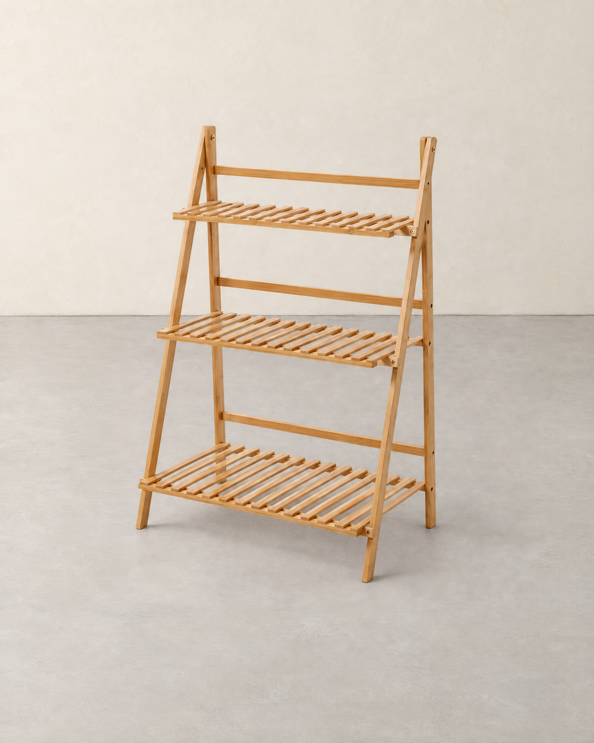 Folding natural wood ladder plant stand with three slatted shelves, empty