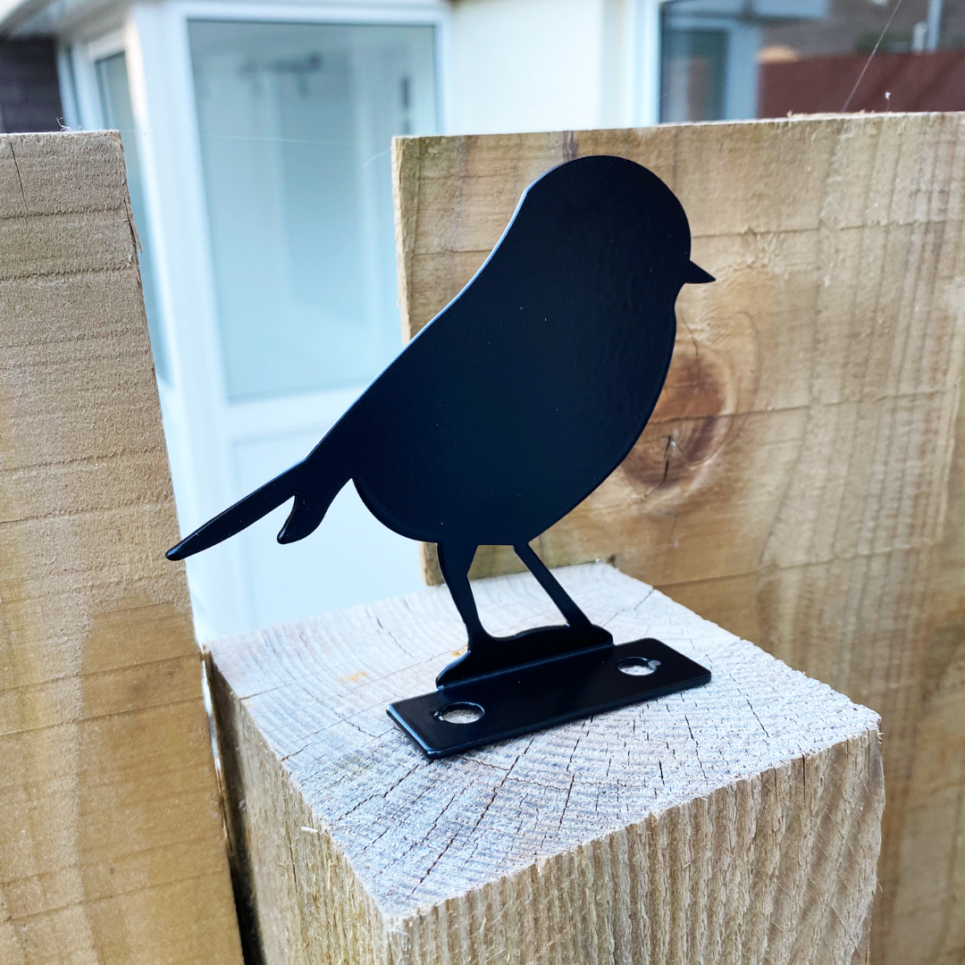 Robin fence topper on a timber post, showing its base plate